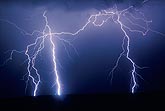 Four bolts, one very bright, demonstrate lightning behavior