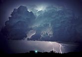 Cumulonimbus storm cloud with intracloud lightning