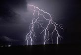 Two lightning flashes showing very similar patterns in lightning