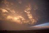 A powerful storm with golden Mammatus clouds
