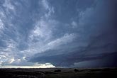 A churning storm with a sculpted wall cloud