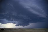 A wall cloud below the flanking line and inflow axis of a supercell 