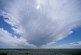 A view upwind of a small, isolated Cumulonimbus anvil cloud