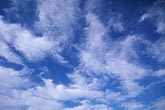 Carefree fibrous clouds in a bright blue sky