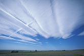 Bands of high Altocumulus clouds in a standing lee wave pattern
