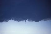 Tornado sequence: a small needle funnel cloud twists down