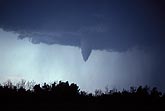 A laminar funnel cloud warns of an imminent tornado
