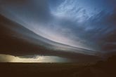 An Arcus cloud with laminar appearance precedes a squall line