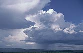 A small single-cell thundershower cloud formed in light winds