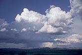 Boiling Towering Cumulus clouds produce rain showers