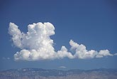A Towering Cumulus boils up in a growing line of Cumulus