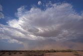 Desert clouds of blowing dust precede a storm