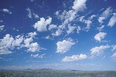 Altocumulus Floccus clouds with isolated elements