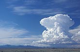 Isolated thunderstorm cloud cell triggered by converging upslope winds
