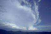 A storm preceded by an anvil cloud with ghost anvils