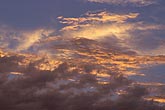 A multi-layered sunset with a range of colors in clouds