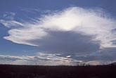 The remains of earlier storms: mix of cloud patches and a orphan anvil 