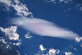 Irisation (iridescence) colors a spear of cloud with beautiful color