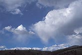 Cumulus clouds with Virga, from showers over mountain ridges