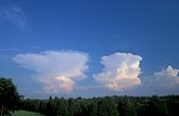 Three Cumulonimbus clouds at different stages of development