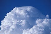 Mountain of rising air with a small Pileus cap cloud