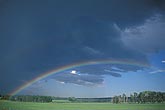 A rainbow offers hope under a dark cloud