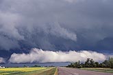 Scud (Pannus) below a storm resembles Stratus Fractus clouds (top)