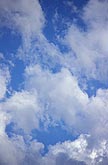 Abstract cloudscape: carefree puffs of cloud in a heavenly skyscape