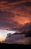 Enchantment and drama in a surreal stormy sunset sky