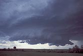 A wall cloud with weak rotation feeding air into a supercell