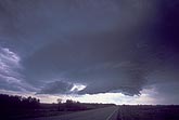 Weak rotation in a collapsing wall cloud as a storm is weakening