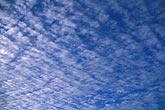 Fine texture weaves through a sheet of Altocumulus in this abstract 