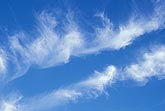 Free-floating, whirling Cirrus cloud in a blue sky