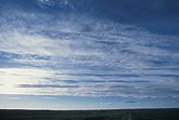 Cloud types, Ac: high, thin Altocumulus clouds in evening light