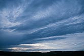 Cloud types, Ac: dense, windswept Altocumulus clouds 
