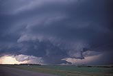 A classic supercell, below which low clouds are gathering