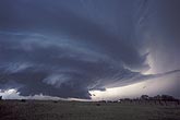 A classic supercell storm shapes and controls flow and clouds