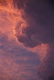 Abstract cloudscape of enchanted pink billows of cloud