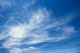 Fibrous cloud texture in a soft blue sky abstract