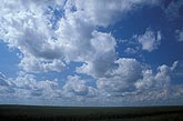 Cloud types, Cu: Cumulus clouds grow as sky fills with Fractus