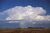 Cloud types, Cb: Cumulonimbus with bright flared top and flat base
