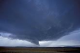 A supercell thunderstorm type with inflow tail and rain-free base