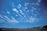 An Altocumulus cloud patch has separated into small Floccus elements