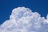 Picture of purity as boiling white cloud billows up in the clear sky
