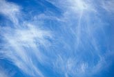 Sky texture abstract: wispy fallstreaks weave a veil across the sky