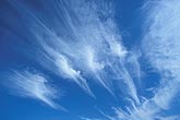 Wispy streaks of Cirrus clouds with long ice-crystal fall streaks