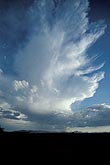 A Cumulonimbus storm cloud seems to burst with surprise