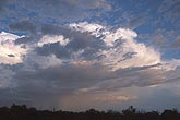 An enchanting view of a Cumulonimbus storm in soft twilight