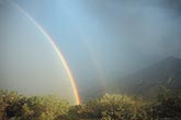 A double rainbow with a misty yellow color 