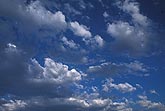 High contrast abstract cloudscape: bright white, gray and blue